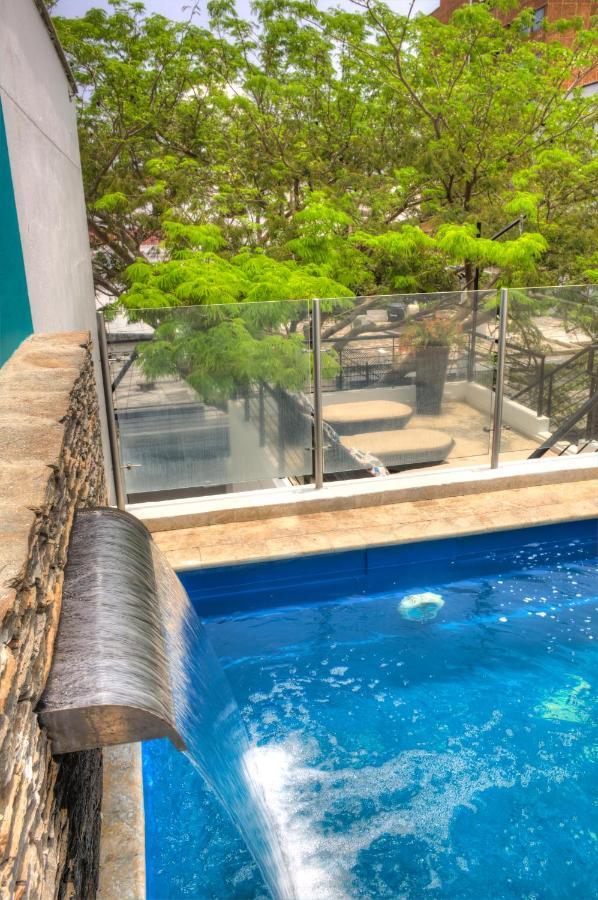 Casa De Leda, A Kali Hotel Santa Marta  Exteriör bild A pool barrier