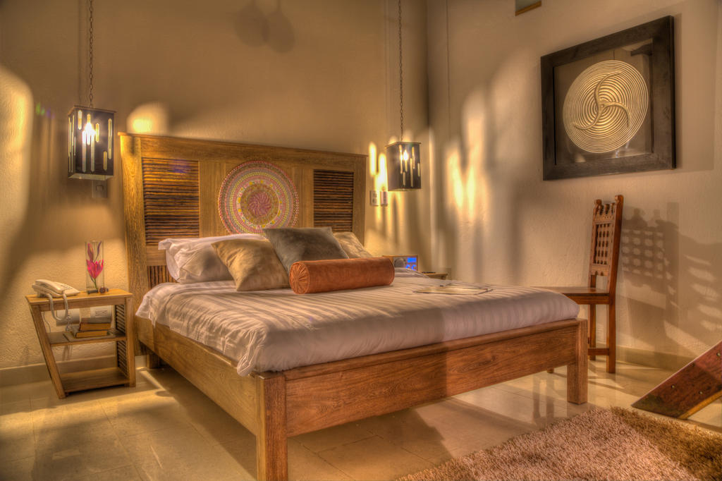 Casa De Leda, A Kali Hotel Santa Marta  Rum bild A bedroom at the hotel